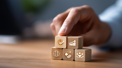 A hand arranges wooden blocks with teamwork and partnership icons, hyper-realistic symbols with clear textures, moody shadows on a table, bright saturation in collaboration visuals