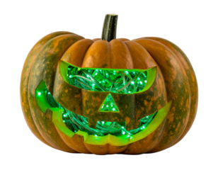Pumpkin with LED lights glowing green inside, isolated