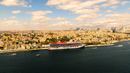 Downtown of Istanbul, Turkey from above: Galata, transport traffic, ferryboats, and ships sailing, Eminonu and Karakoy pier, Aerial drone view at sunny day