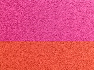 Fototapeta premium Brightly colored textured background of vibrant pink and orange hues, divided horizontally for visual contrast.
