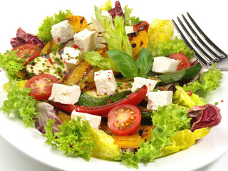 Fresh Mixed Salat with Feta Cheese isolated on white Background