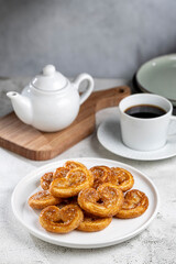Tasty French Palmier Cookies Pastry. Palmiers or elephant ears.