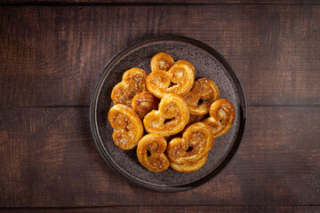 Tasty French Palmier Cookies Pastry. Palmiers or elephant ears.