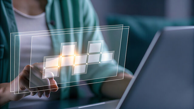 Laptop with glowing futuristic holographic 3d printing technology display