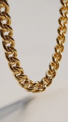 Fototapeta premium Close-up of a chunky gold chain necklace