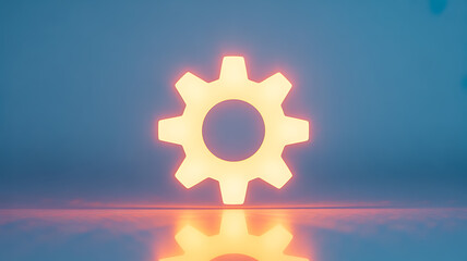 Glowing gear symbol on reflective surface with soft blue background