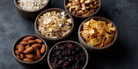 Fototapeta premium Variety of healthy snacks in eco friendly bowls