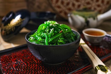 Seaweed salad,wakame salad, chuka wakame in black bowl