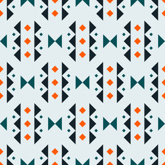 Fototapeta premium Seamless ethnic geometric pattern with tribal and cultural style, perfect for textile, fabric, wallpaper, and modern decorative backgrounds.