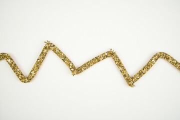 Gold Glitter Zigzag Garland on White Background