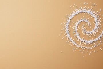 White Confetti Spiral on Beige Background