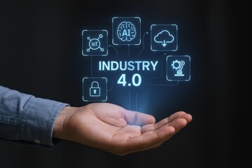 Industry 4.0 Concept: Hand Holding Digital Icons Representing Automation, AI, Cloud Computing and Security on Dark Background