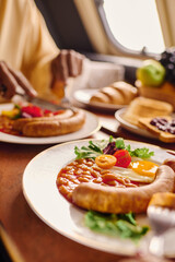 Enjoying a delicious breakfast at a cozy cabin perfect for glamping adventures