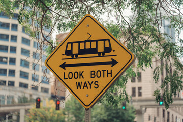look both ways pedestrian crossing trolley sign