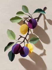 Paper plums on branch, light and shadow