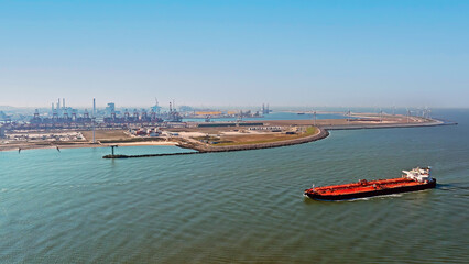 Aerial from a freighter cruising on the North Sea in front of the port of  Rotterdam in the Netherlands