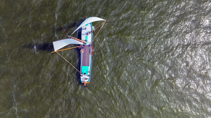 Aerial topshot from an ancient wooden sailing boat on the IJsselmeer  in Friesland the Netherlands © Nataraj