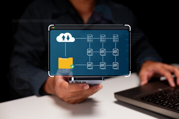 A person interacts with a digital interface displaying cloud storage and data organization, emphasizing technology and connectivity.