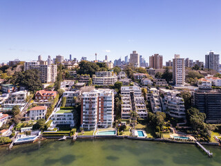 Sydney, Australia: Aerial view of the Elizabeth Bay affluent suburb with luxury houses and apartment towers by the Sydney harbor in Australia