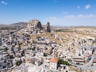 Cappadocia, Turkey: Aerial view of the famous Uchisar town and castle in the Cappadocia region in Anatolia in Turkey