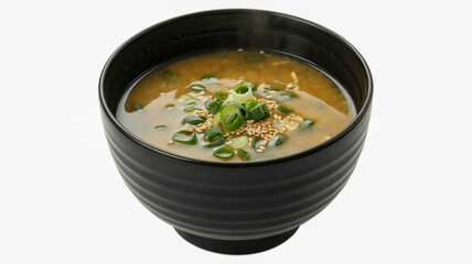 Delicious miso soup in a black bowl with fresh scallions garnished for a perfect meal