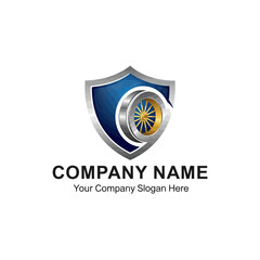 A corporate logo template featuring a blue shield with a silver border, enclosing a metallic wheel or turbine emblem.