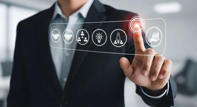 Businessman touching a futuristic interface with icons representing business processes and growth