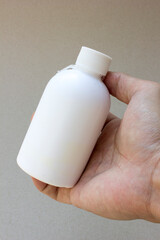 White bottle of glue isolated on transparent background. This glue is commonly used to glue items for creative hobbies as well as for school or office purposes.