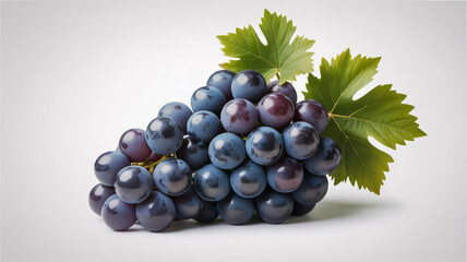 Fototapeta premium Fresh dark purple grapes with green leaves on a light background