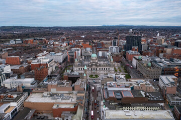 Fototapeta premium Wide aerial panorama of Belfast city center with City Hall dome and surrounding buildings