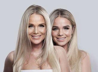 Indoor portrait of young model woman and mature woman. Two female faces collage set. Old and young face