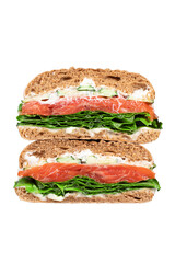 Pieces of salmon sandwich with cream cheese on transparent background