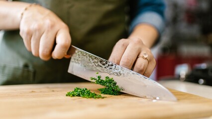 chef cutting a knife