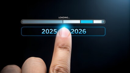 Loading bar with 2025 and 2026, finger pointing at the screen.