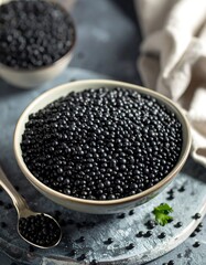 Black lentils in a bowl