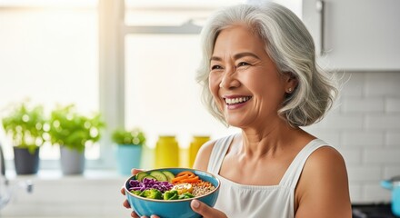 Smiling Senior Woman Holding Healthy Bowl Of Food In Bright Kitchen