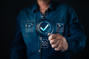 person hold magnifying glass with glowing checkmark surrounded by digital documents and AI icon representing verification,approval,document review,compliance,accuracy,and digital validation processes.