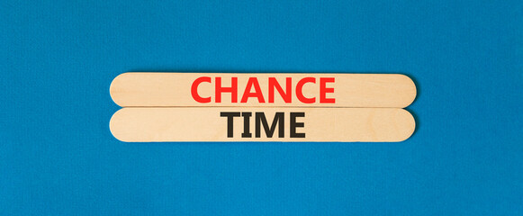 Chance time symbol. Concept word Chance time on beautiful wooden sticks. Beautiful blue paper...