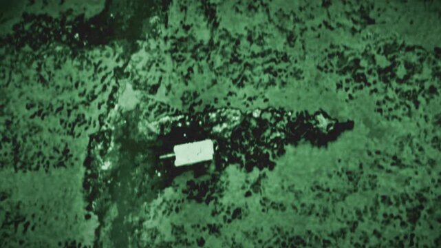 Device Flying Over Military Tank Takes Aim Of Target. Infrared Guided Weapon In Army Attack. Army Attack To Fulfill Secret Operation. Army Attack Destroys Enemy Combat Vehicle. Scanning Map.