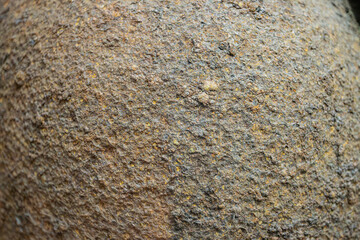Close-up of a rusted, irregular metallic object with dark brown patches of rust No context...