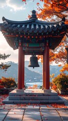Autumnal temple bell overlooking a lake