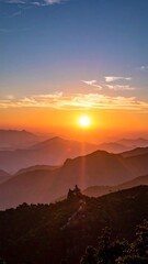 Sunrise over a mountain range, soft focus