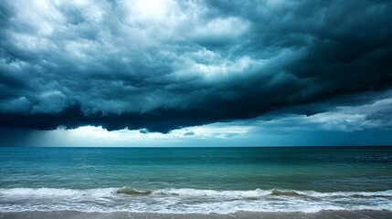 Fototapeta premium Dramatic stormy ocean waves under dark ominous clouds powerful nature photography