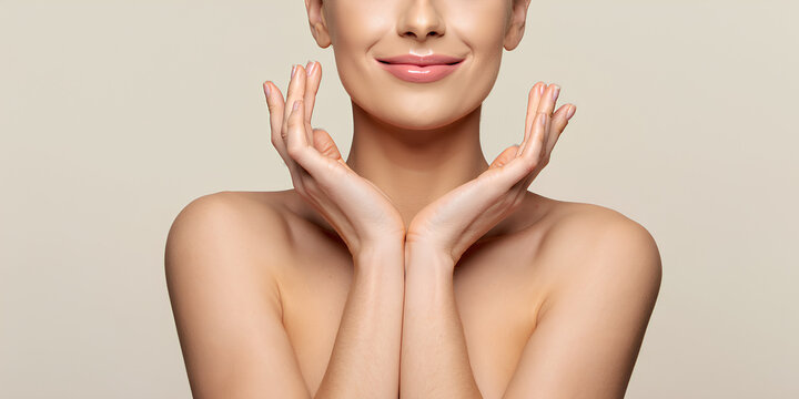 Beautiful Indian girl with perfect skin touching face, crop, attractive young woman closeup portrait, brunette model with natural beauty, healthy skincare, sensual spa glamour posing concept