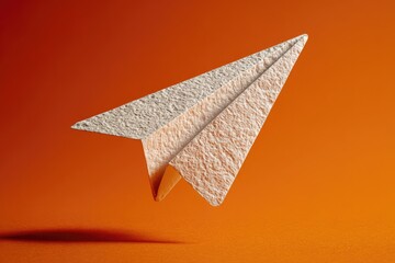Paper airplane in flight