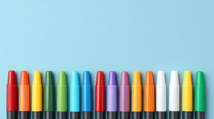 workspace colorful group collaborat Colorful markers arranged neatly on a light blue background.