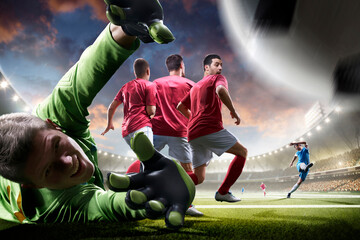 Professional soccer players in action. Tackling the ball. Soccer championship. Soccer arena full of fans. Sports concept. Sunset on stadium. Soccer.