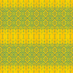 Vibrant Yellow and Teal Ethnic Tribal Pattern. Bold Geometric Diamond Seamless Textile. Traditional Folk Art Fabric Print. Hmong Ikat Style Wallpaper. African Vector Background.