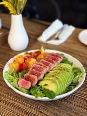 Tuna salad with avocado and tomatoes