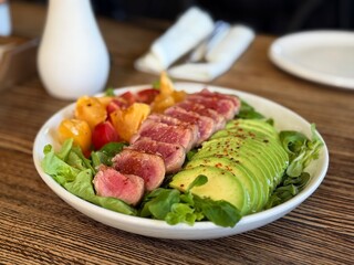 Tuna salad with avocado and tomatoes